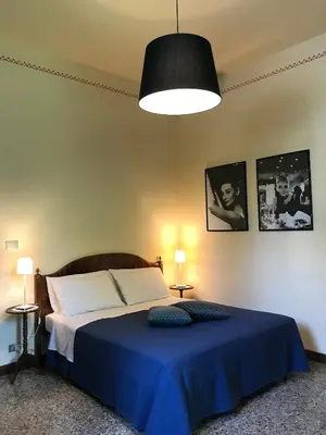 Letto o letti in una camera di La Sosta Fuori Stazione