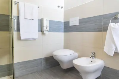 Bagno di La Stazione Camere Caffè