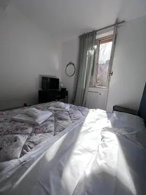 Letto o letti in una camera di Hotel Brenta