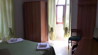 Letto o letti in una camera di Hotel Residence Moneglia