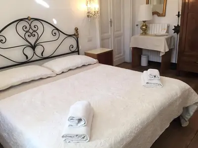 Letto o letti in una camera di B&B Casa Del Priore