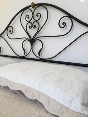 Letto o letti in una camera di B&B Casa Del Priore