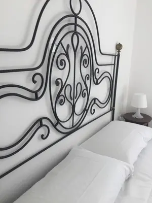 Letto o letti in una camera di B&B Casa Del Priore