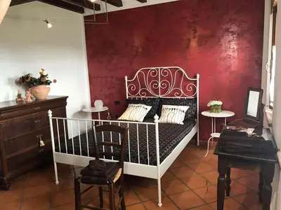 Letto o letti in una camera di B&B Il Martin Pescatore