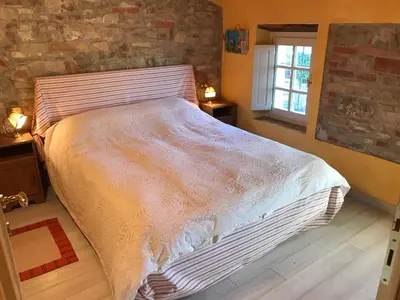 Letto o letti in una camera di Casa Colli Piacentini