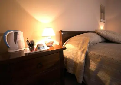 Letto o letti in una camera di Locanda Ca’ Rossa
