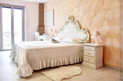 Letto o letti in una camera di Agriturismo le Fontanelle da Valente