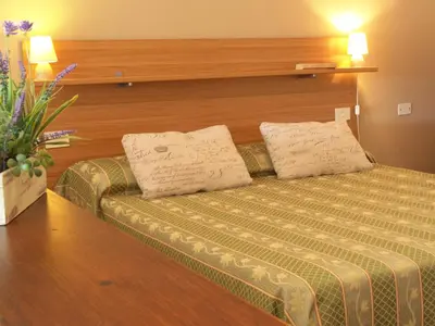 Letto o letti in una camera di Agriturismo La Quiete
