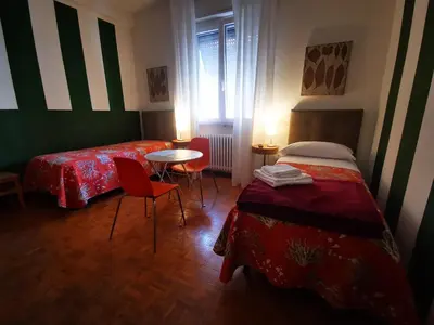 Letto o letti in una camera di Affittacamere Room ospedale Maggiore