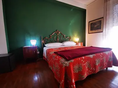 Letto o letti in una camera di Affittacamere Room ospedale Maggiore