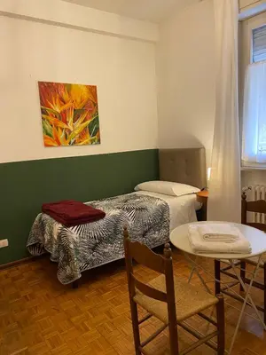Area soggiorno di Affittacamere Room ospedale Maggiore