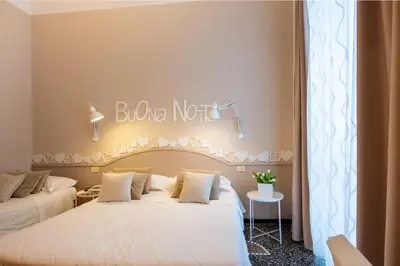 Letto o letti in una camera di Hotel Tigullio