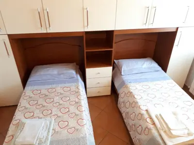 Letto o letti in una camera di Appartamenti Enrica