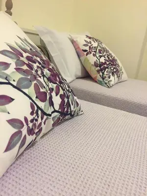 Letto o letti in una camera di Appartamento Romantico