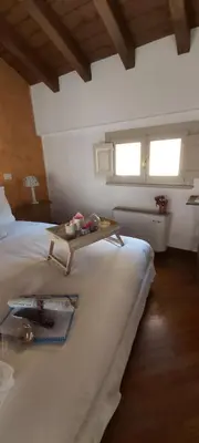 Letto o letti in una camera di B&B Casa del Teatro