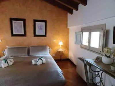 Letto o letti in una camera di B&B Casa del Teatro