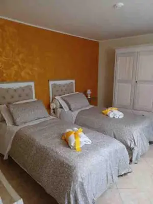 Letto o letti in una camera di B&B Casa del Teatro
