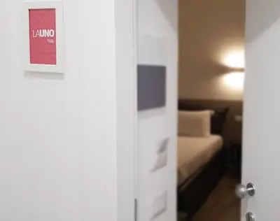 Letto o letti in una camera di Sarzana's Rooms