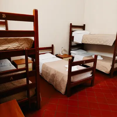 Letto o letti in una camera di Student's Hostel Della Ghiara