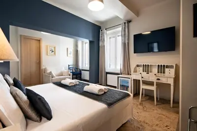 Letto o letti in una camera di Hotel Broletto Mantova - Centro Storico