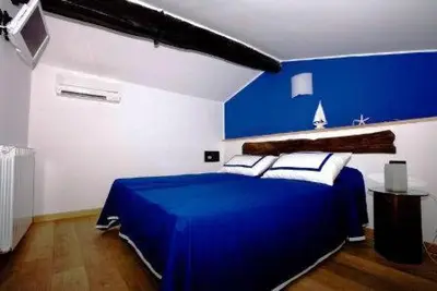 Letto o letti in una camera di Affittacamere Da Cesare