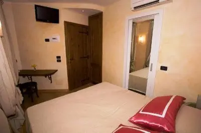 Letto o letti in una camera di Affittacamere Da Cesare