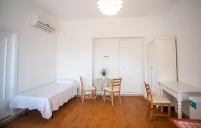 Letto o letti in una camera di Villa Mori