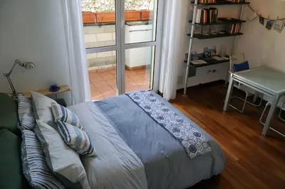 Letto o letti in una camera di Casa Lorelei