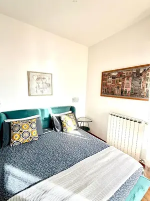 Letto o letti in una camera di Casa della Domenica