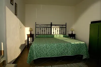 Letto o letti in una camera di B&B Podere Bramapane