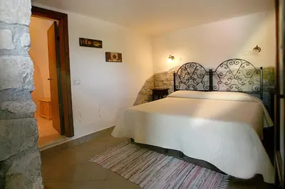 Letto o letti in una camera di B&B Podere Bramapane