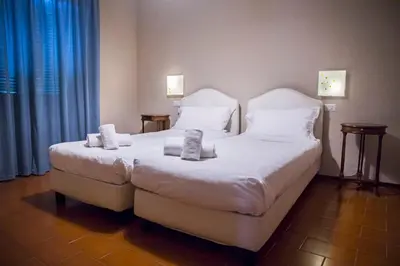 Letto o letti in una camera di Bastimento
