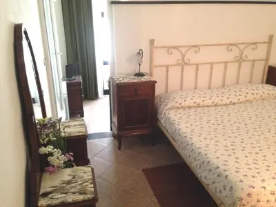 Letto o letti in una camera di Le Conchiglie