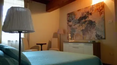 Letto o letti in una camera di Agriturismo Corte Speranza