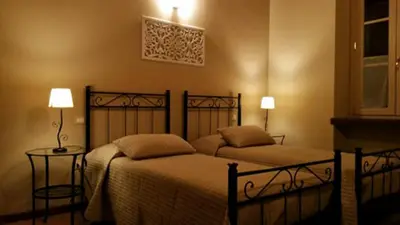 Letto o letti in una camera di Agriturismo Corte Speranza