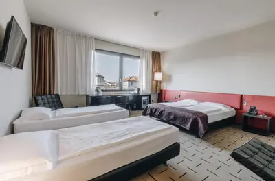Letto o letti in una camera di Hotel Continental