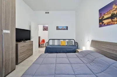 Letto o letti in una camera di BellaMantova 2