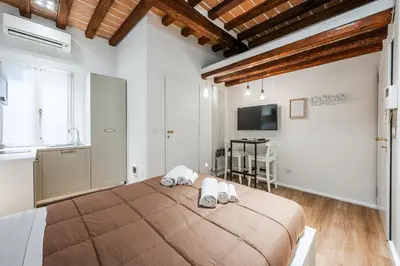 Letto o letti in una camera di Masone Home