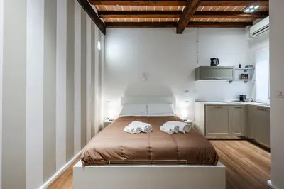 Letto o letti in una camera di Masone Home