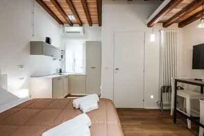 Letto o letti in una camera di Masone Home