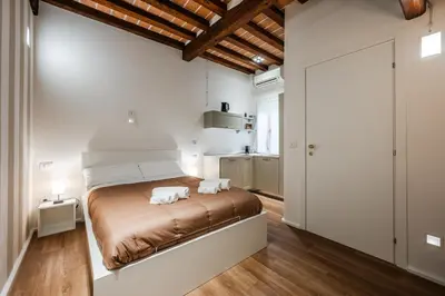 Letto o letti in una camera di Masone Home