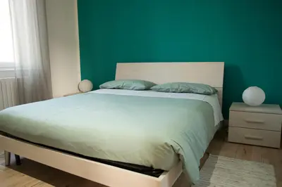 Letto o letti in una camera di Domus vicina al Centro Storico
