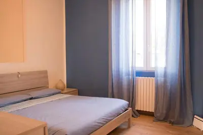Letto o letti in una camera di Domus vicina al Centro Storico