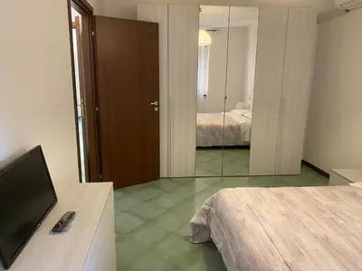 Letto o letti in una camera di Smeraldo