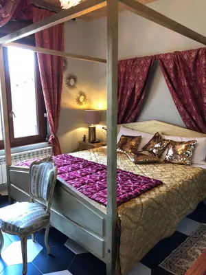 Letto o letti in una camera di Dimora del Podestà