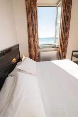 Letto o letti in una camera di 331 - Lord Nelson Appartamento Fronte e Vista Mare 4
