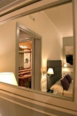 Letto o letti in una camera di Hotel La Colonnina