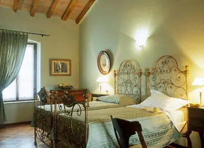 Letto o letti in una camera di Agriturismo Santa Maria Bressanoro