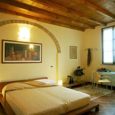 Letto o letti in una camera di Agriturismo Santa Maria Bressanoro