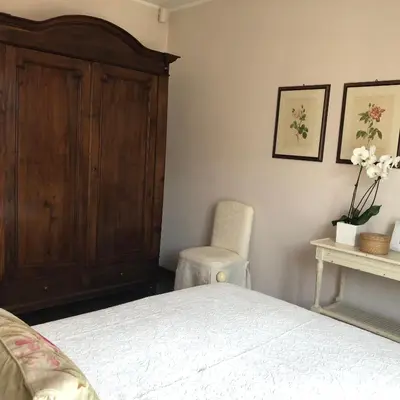 Letto o letti in una camera di il corbezzolo - Suite